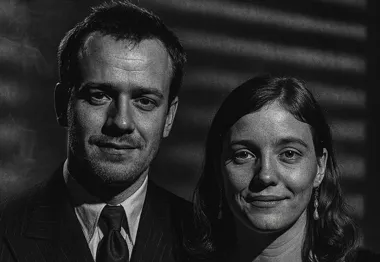 Film noir: The same couple in an AI style set in a film noir